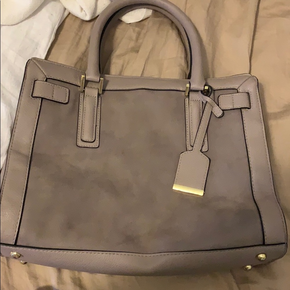 Grey purse with slots